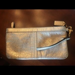Coach gold leather clutch